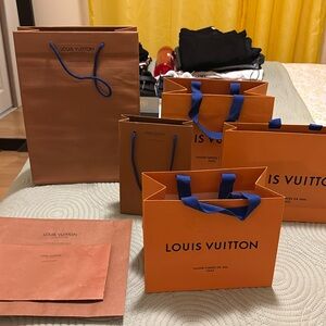 Louis Vuitton shopping bags and envelopes